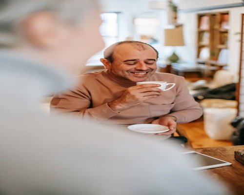 Man enjoying a cup of coffee in the morning